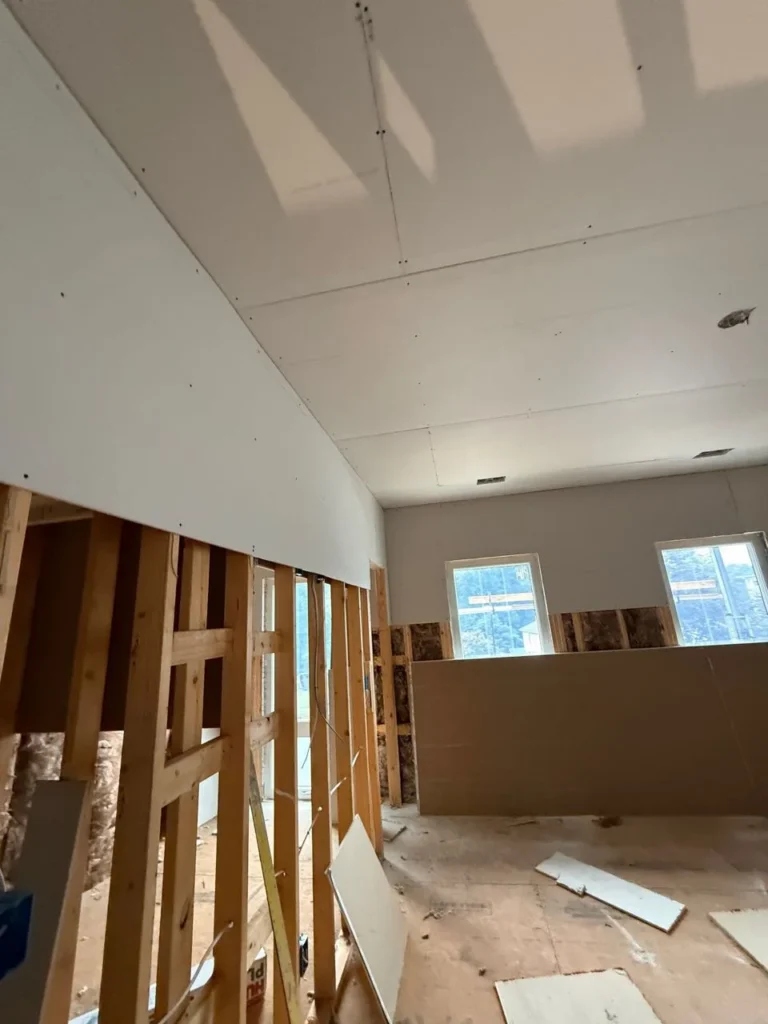 Drywall installation underway at the 2005 Cantata Ct custom home in Vienna, Virginia